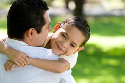 hisp-dad-son-hug-smiles